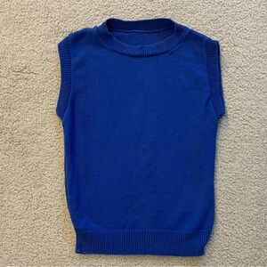 Vintage 1980s Blue sleeveless sweater vest.